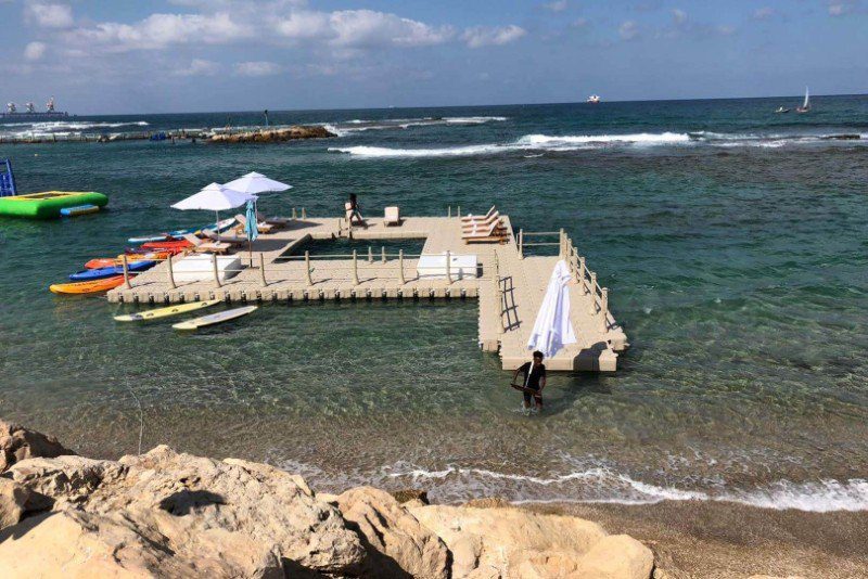 Original CanDock floating waterfront recreation platform photographed in turquoise waters