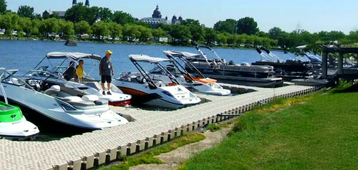 Boats moored at modular floating docks