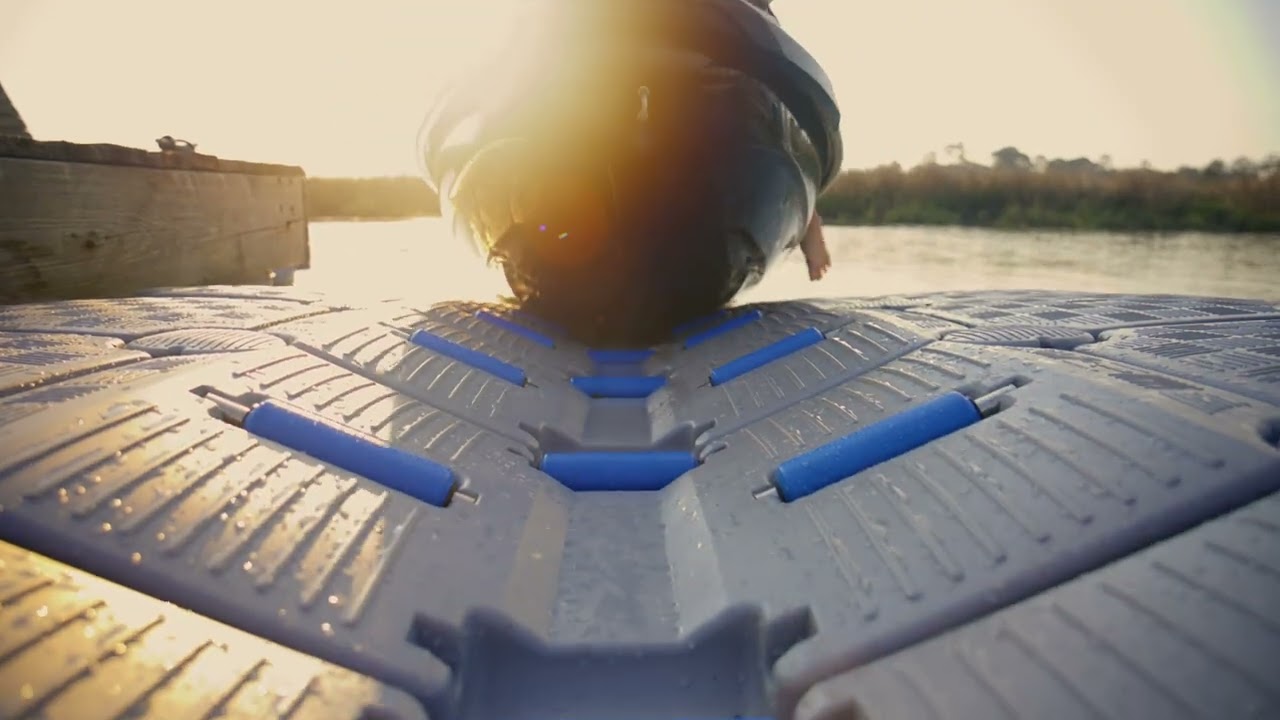 Original CanDock V-Roll footage showing a boat approaching the modular drive-on docking system